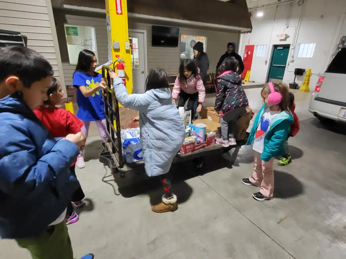 Loading the cart with donated goods