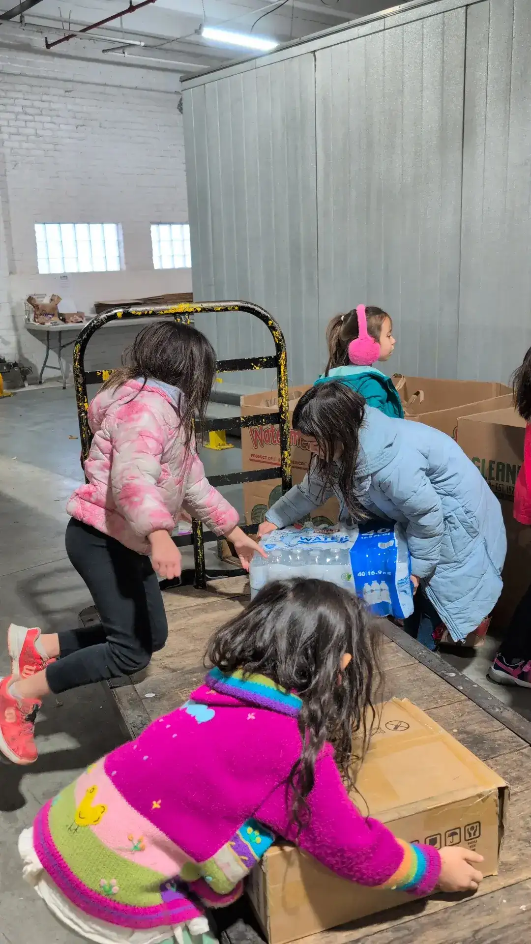 Working together to move cases of water