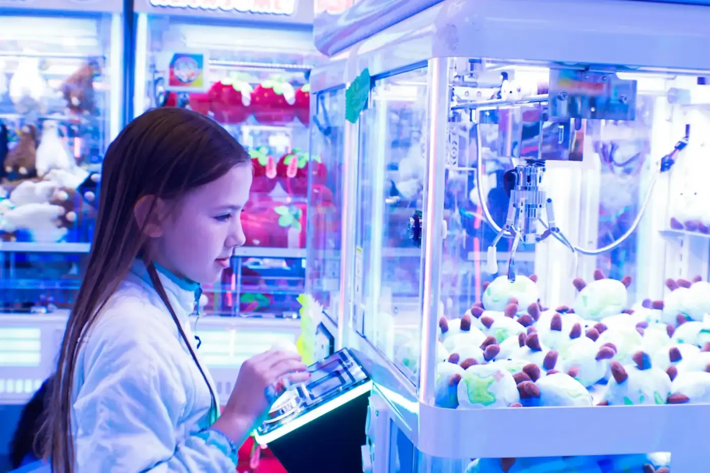 Focused player going for mini Earth Day plushies