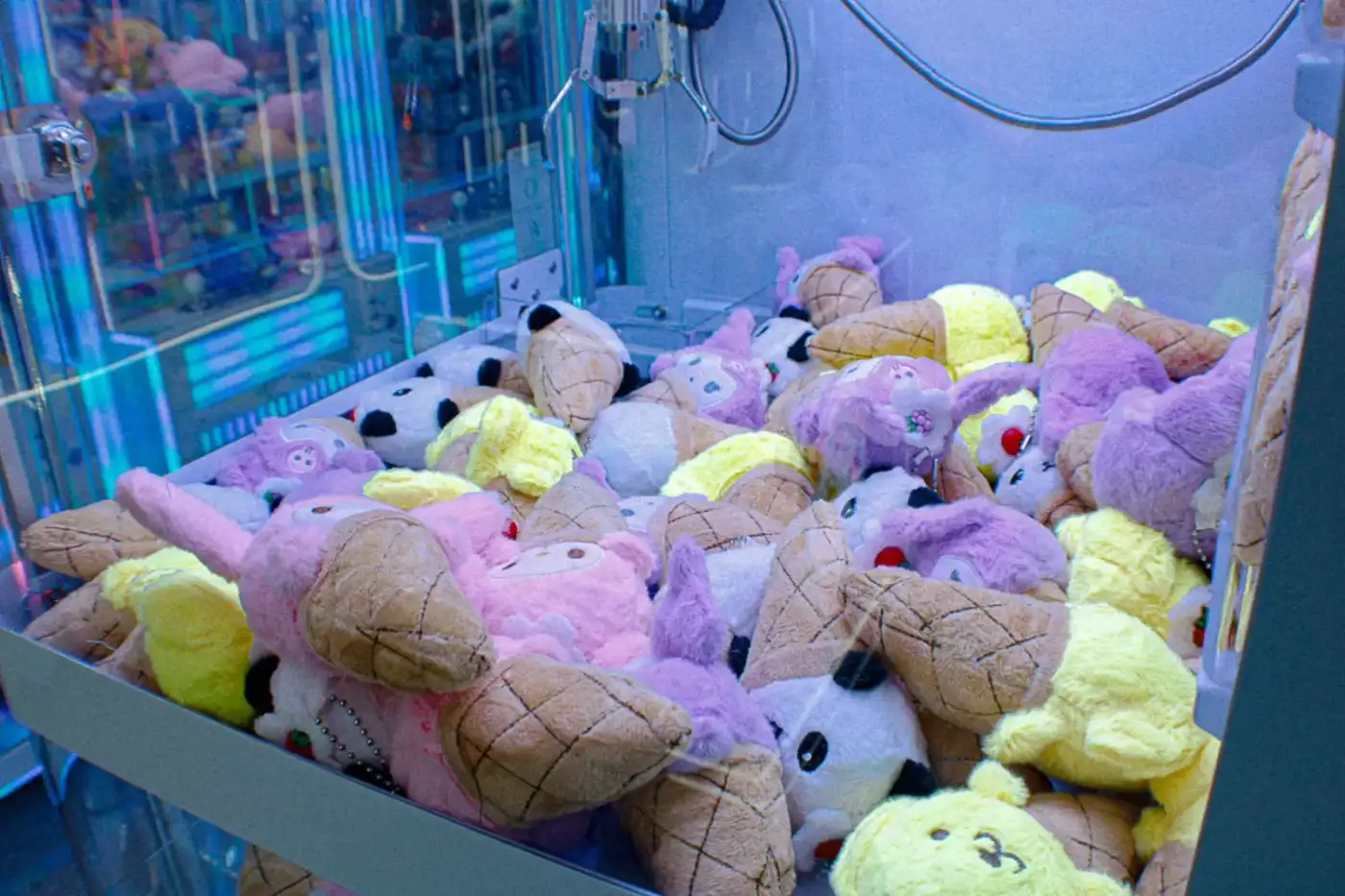 Ice cream cone plushies stacked in the claw machine